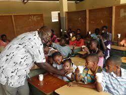 Children getting milk in their classroom